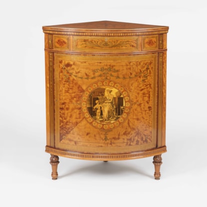 A Fine Corner Cabinet Firmly Attributed to Maples & Co
