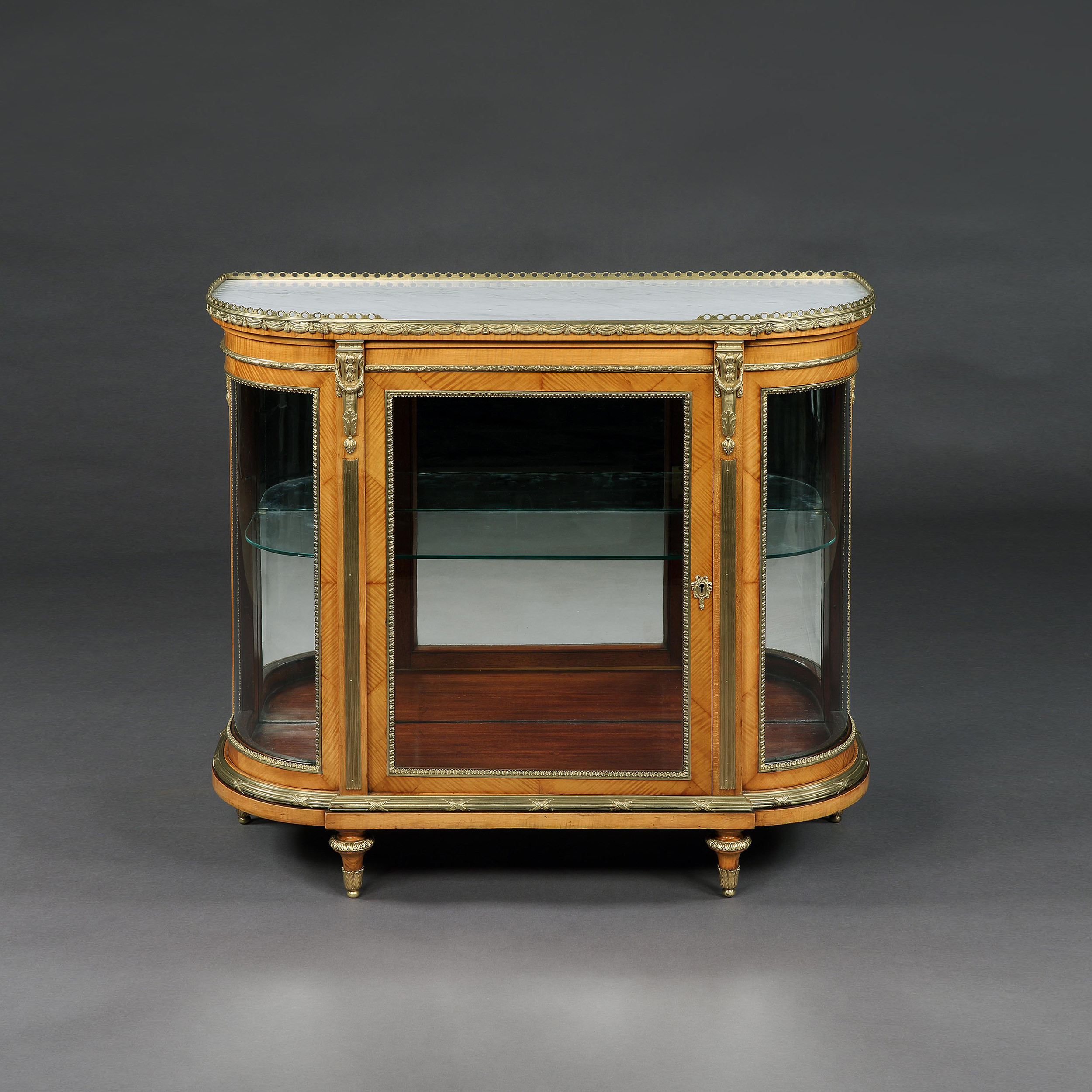 A Pair of Display Cabinets By C. Mellier & Co
