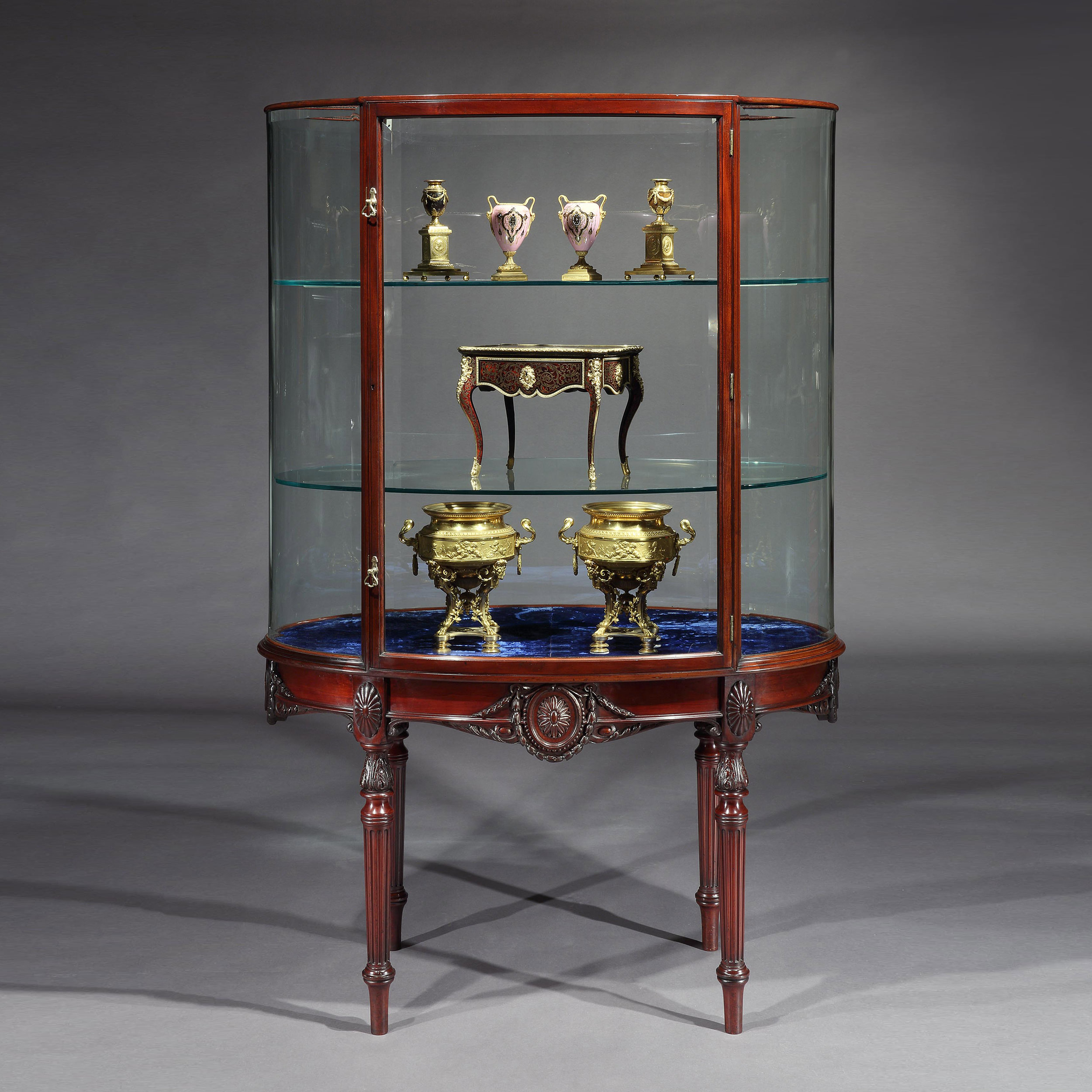 A Display Cabinet in the Adam manner By F. Sage & Co
