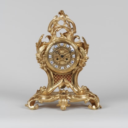 An Elegant Mantle Clock In the Louis XV Manner