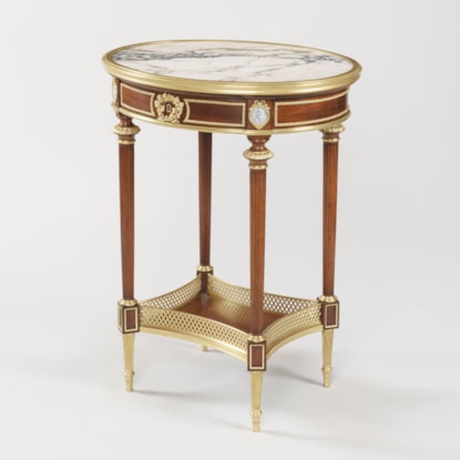 A Louis XVI Style Occasional Table By Henry Dasson