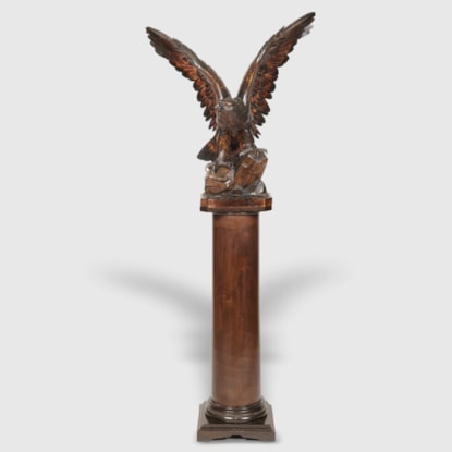 A Black Forest Sculpture of an Eagle on Stand