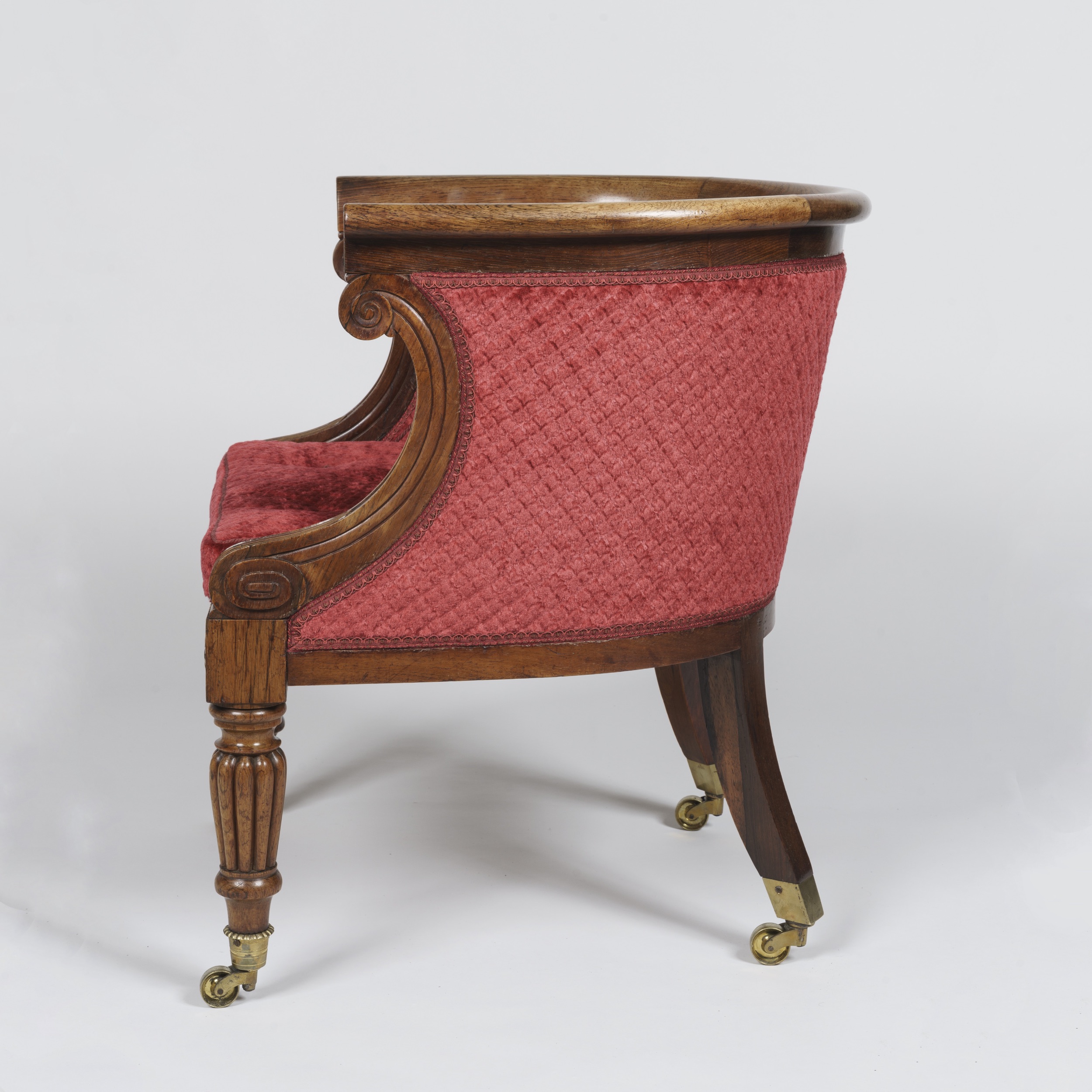 A Pair of Regency Period Bergère Armchairs