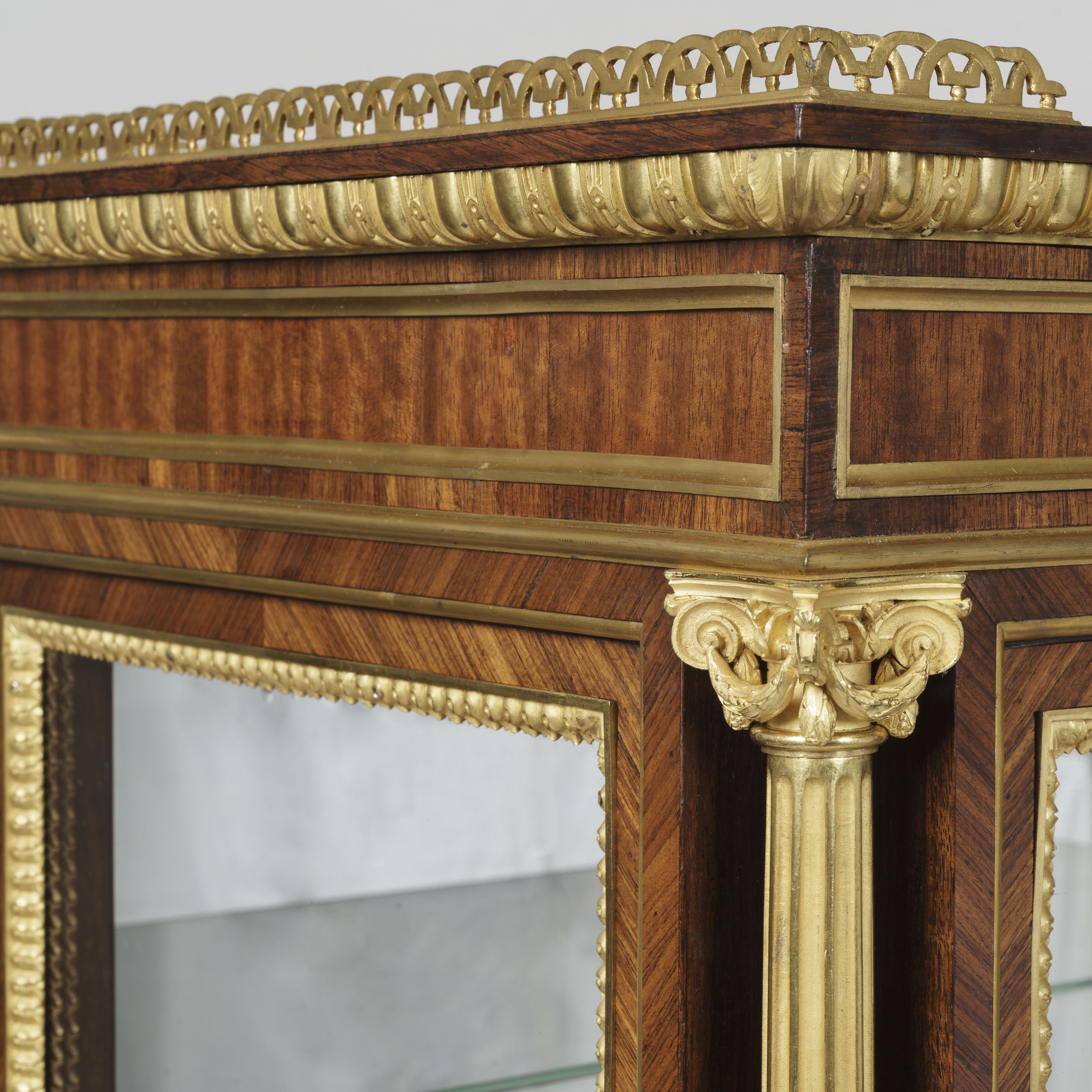 A Pair of Display Cabinets in the Louis XVI Manner