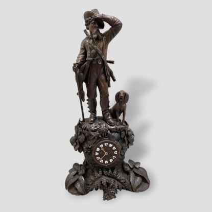 A Black Forest Carved Hunt Clock