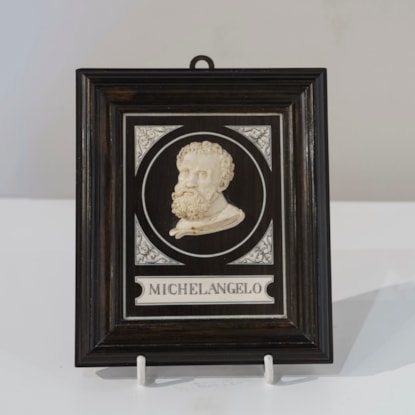 A Miniature Carved Ivory Bust of Michelangelo by Giovanni Battista Gatti