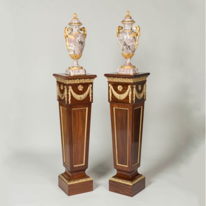 A Pair of Ormolu-Mounted Pedestals By Trollope & Sons