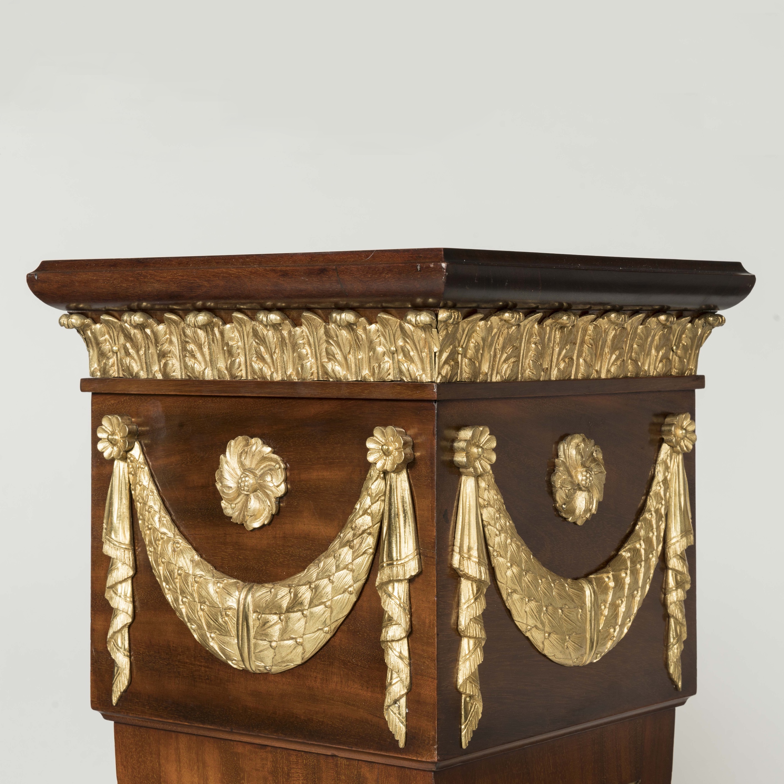 A Pair of Ormolu-Mounted Pedestals By Trollope & Sons