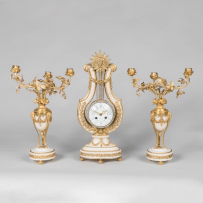 A French Clock Garniture in the Louis XVI Manner