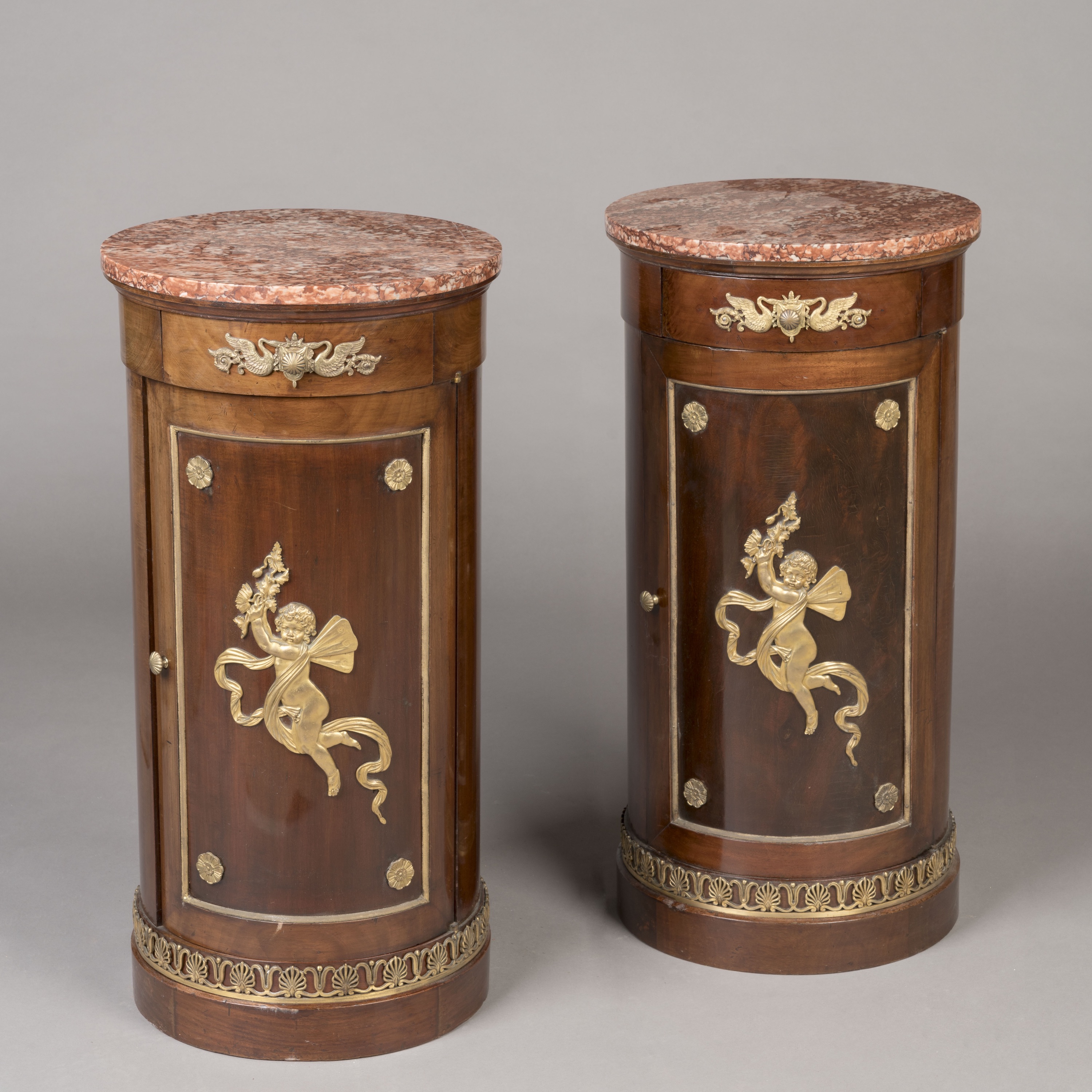 A Pair of Marble Top Cupboards by Maison Krieger