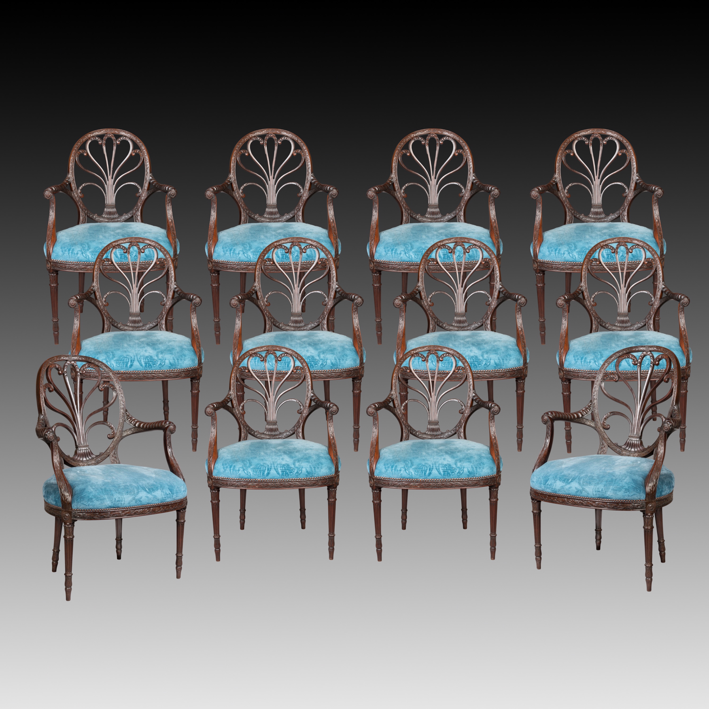 A Superb Set of Twelve Neo-Classical Revival Dining Chairs