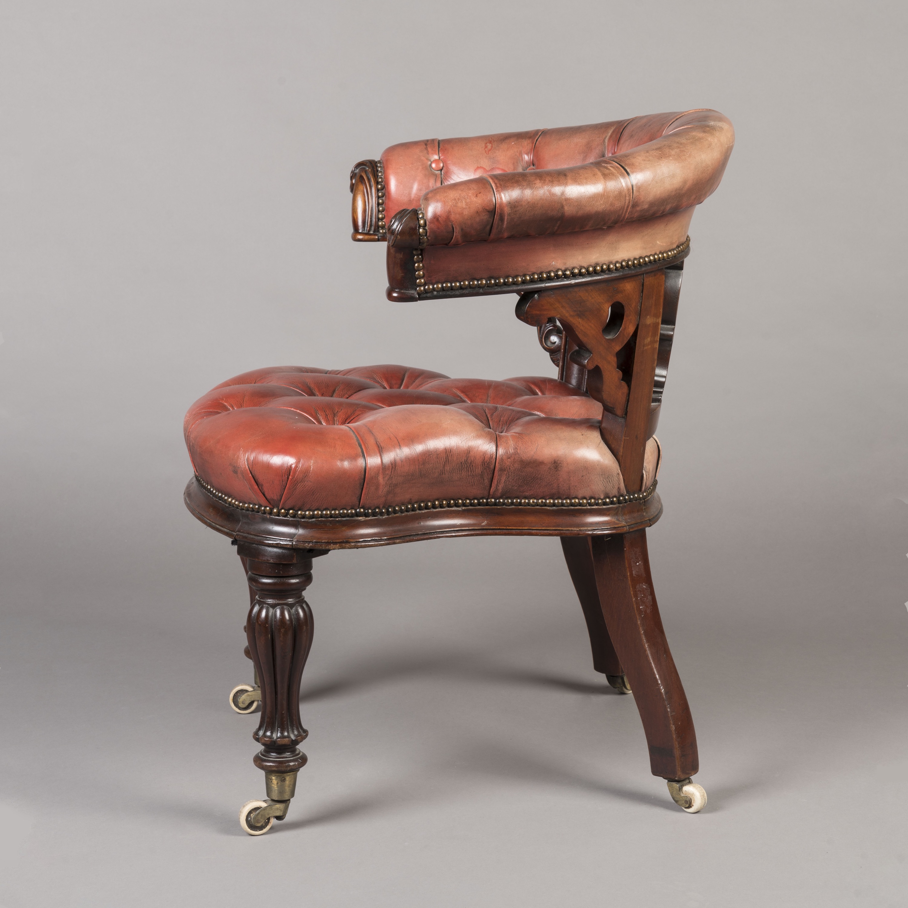 A Mid-19th Century Carved Mahogany Desk Chair