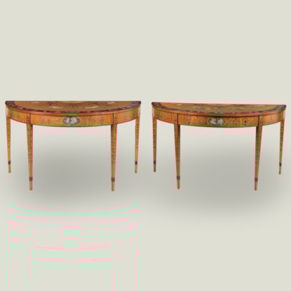 A Fine Pair of Neoclassical Painted Satinwood Console Tables