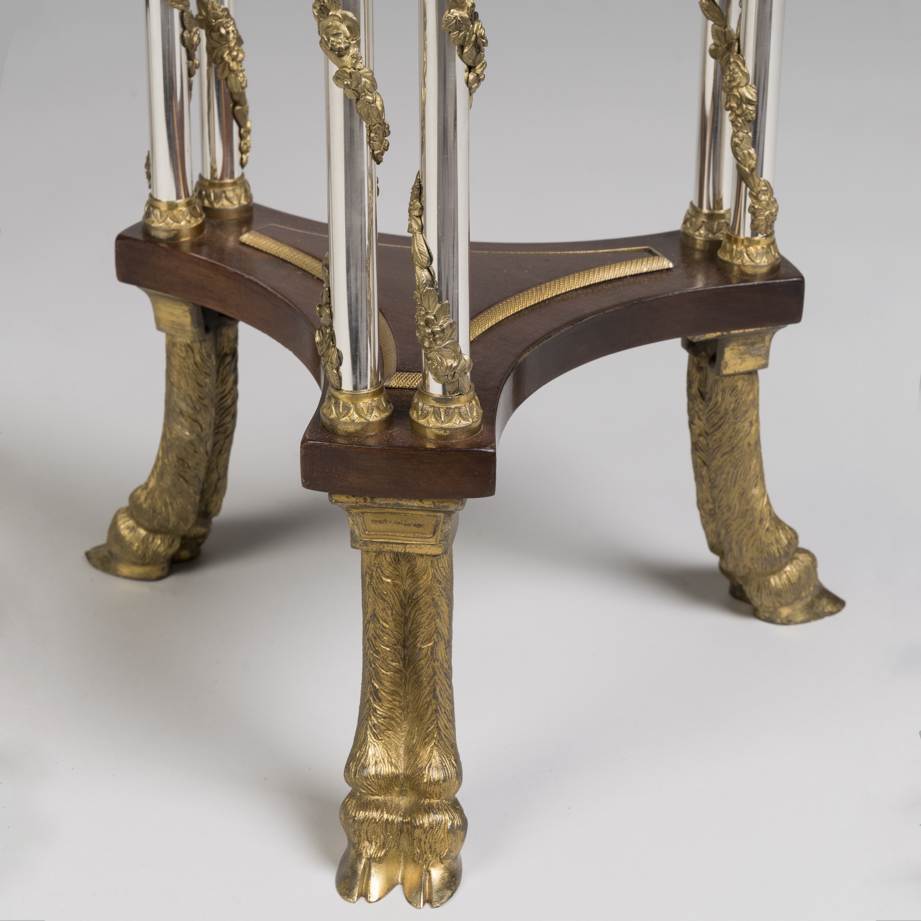 A Pair of Ormolu and Silvered Bronze Gueridons In the manner of Bernard Molitor