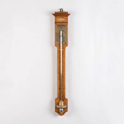 An Empire Cistern Barometer by Gabriel
