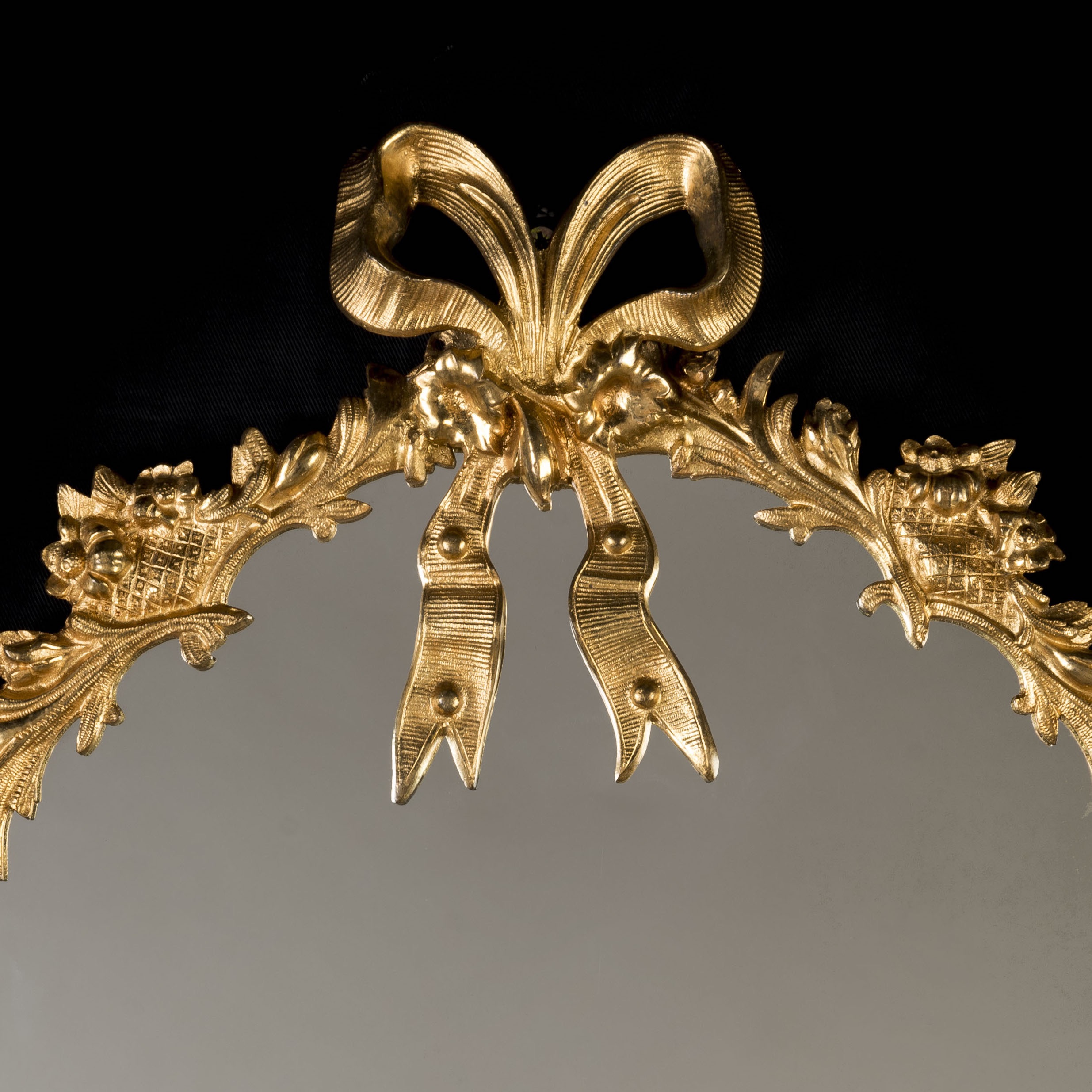 A Set of Three English Ormolu Mirrors