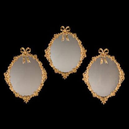 A Set of Three English Ormolu Mirrors
