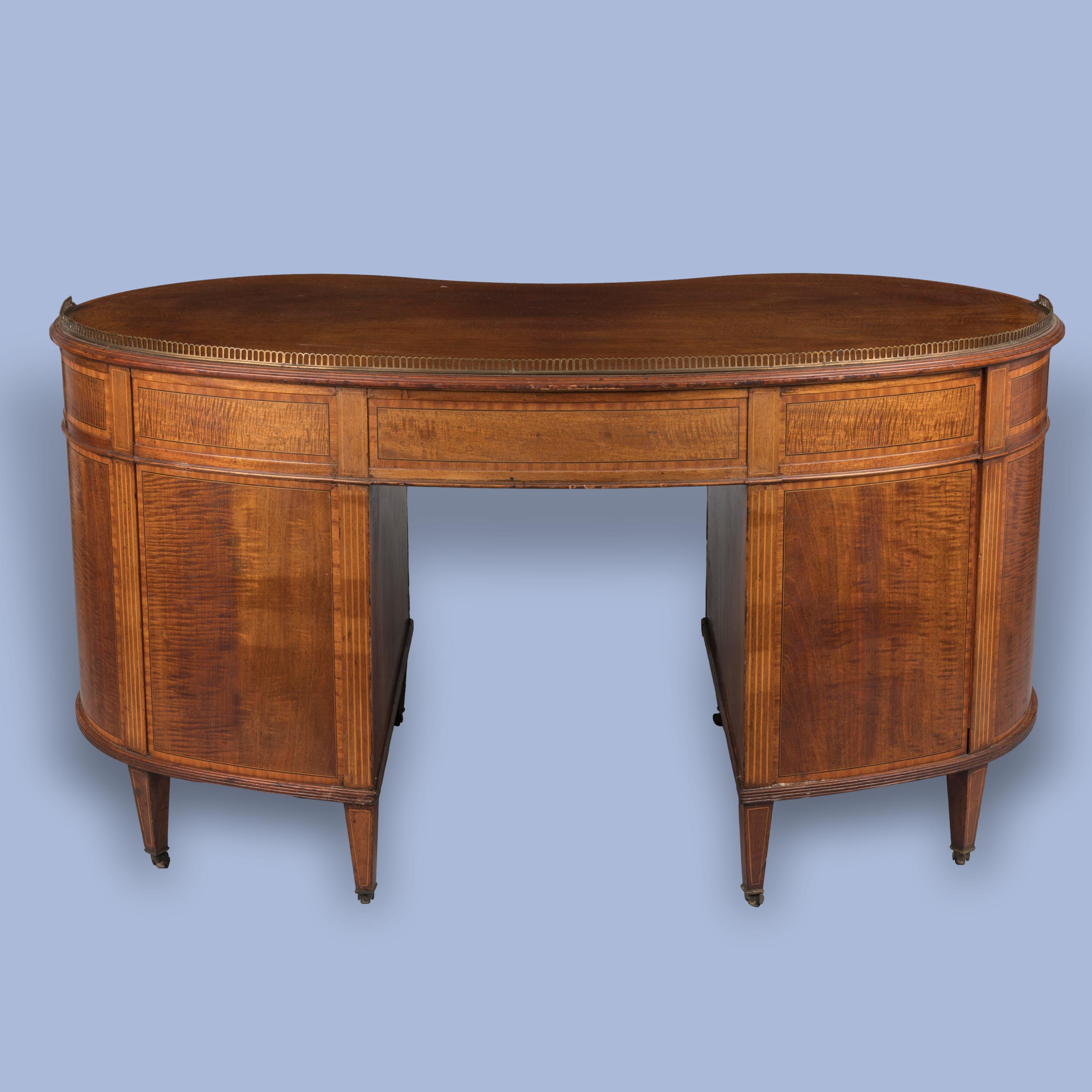A Late 19th Century Mahogany Kidney-Shaped Desk