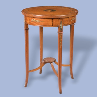 A Painted Satinwood Table In the Neoclassical Manner