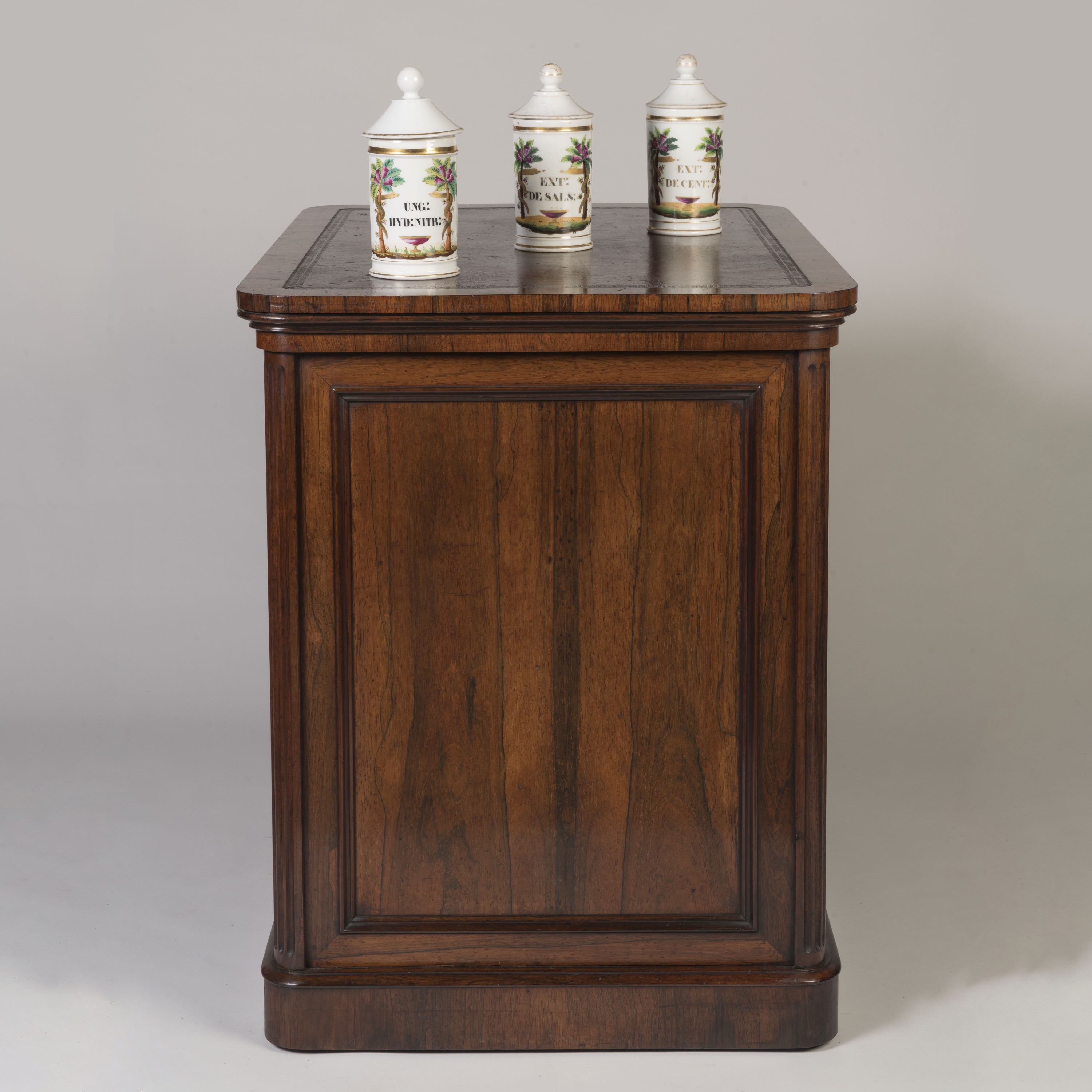 A Stately Double-Sided Bookcase Of the Regency Period