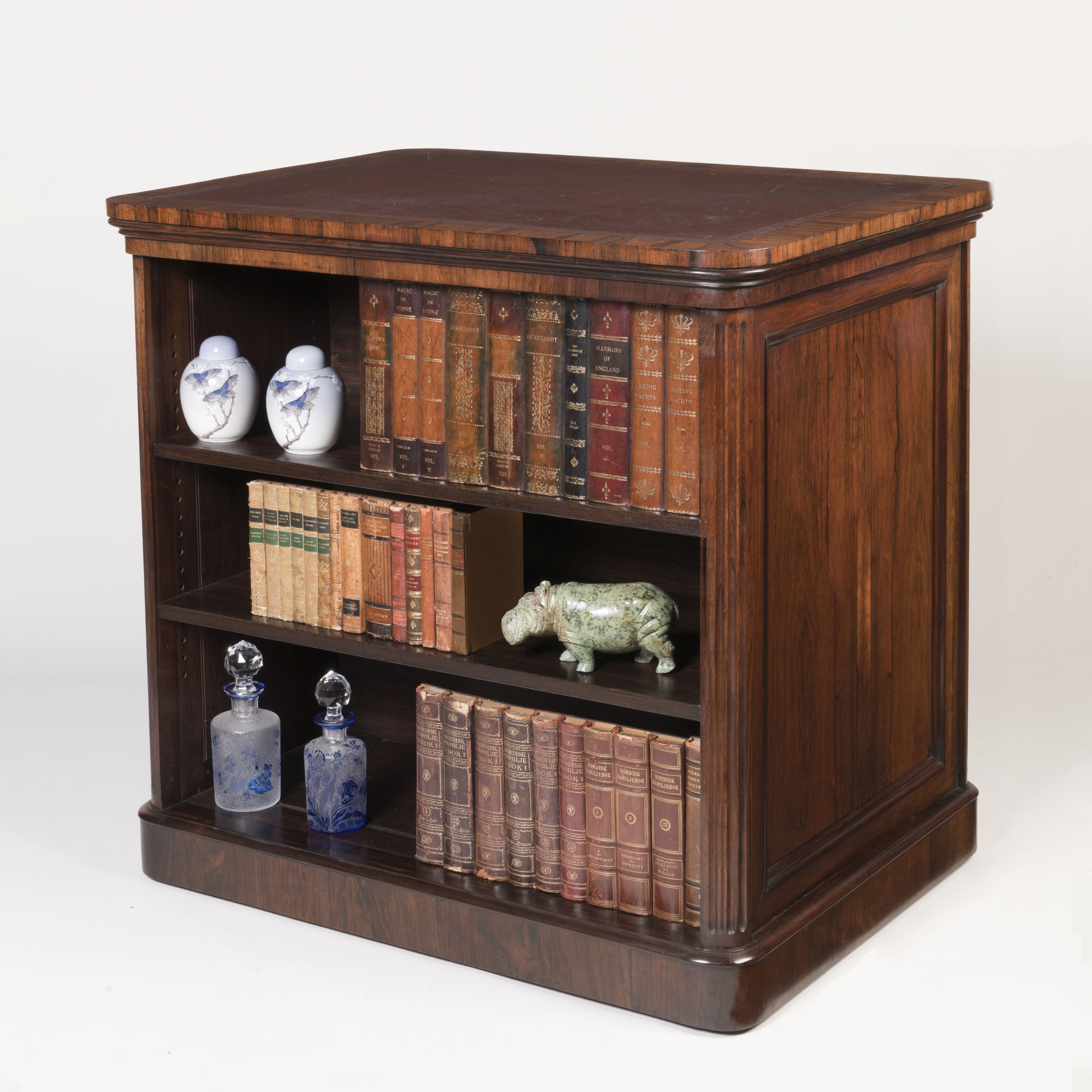 A Stately Double-Sided Bookcase Of the Regency Period