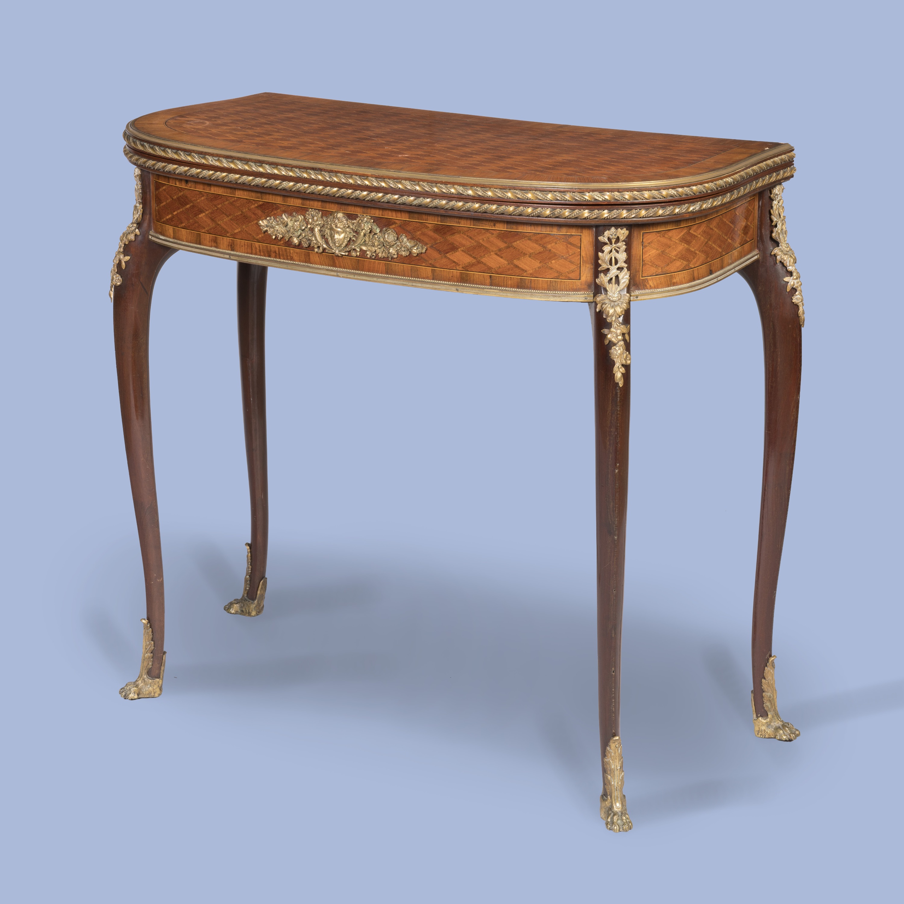 An Ormolu-Mounted Parquetry Card Table Attributed to François Linke