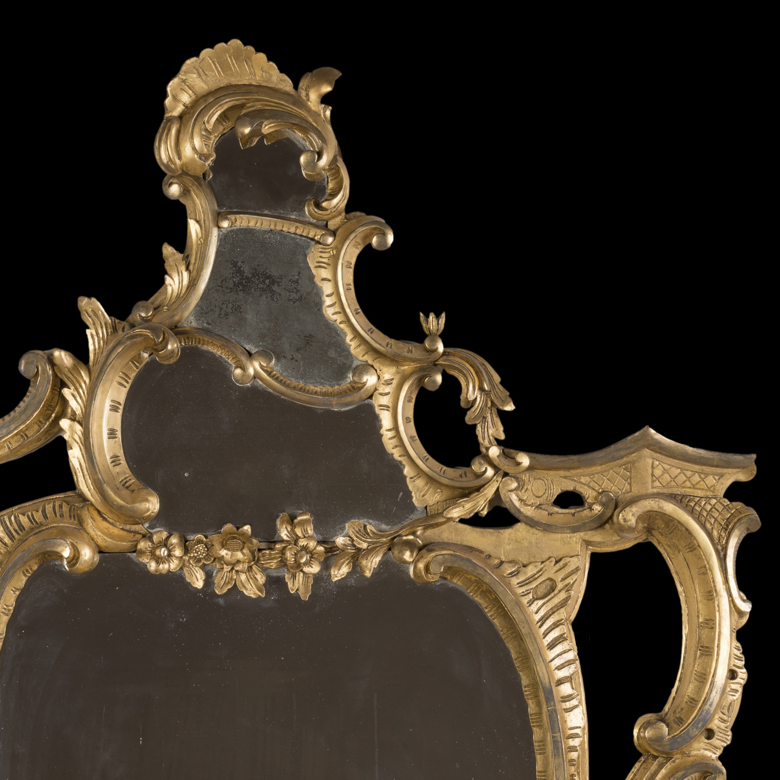A Pair of English Giltwood Carved Rococo Style Mirrors