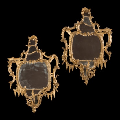 A Pair of English Giltwood Carved Rococo Style Mirrors