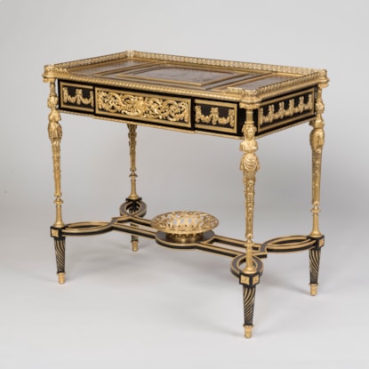 A Louis XVI Style Lacquer Mounted Table by Henry Dasson