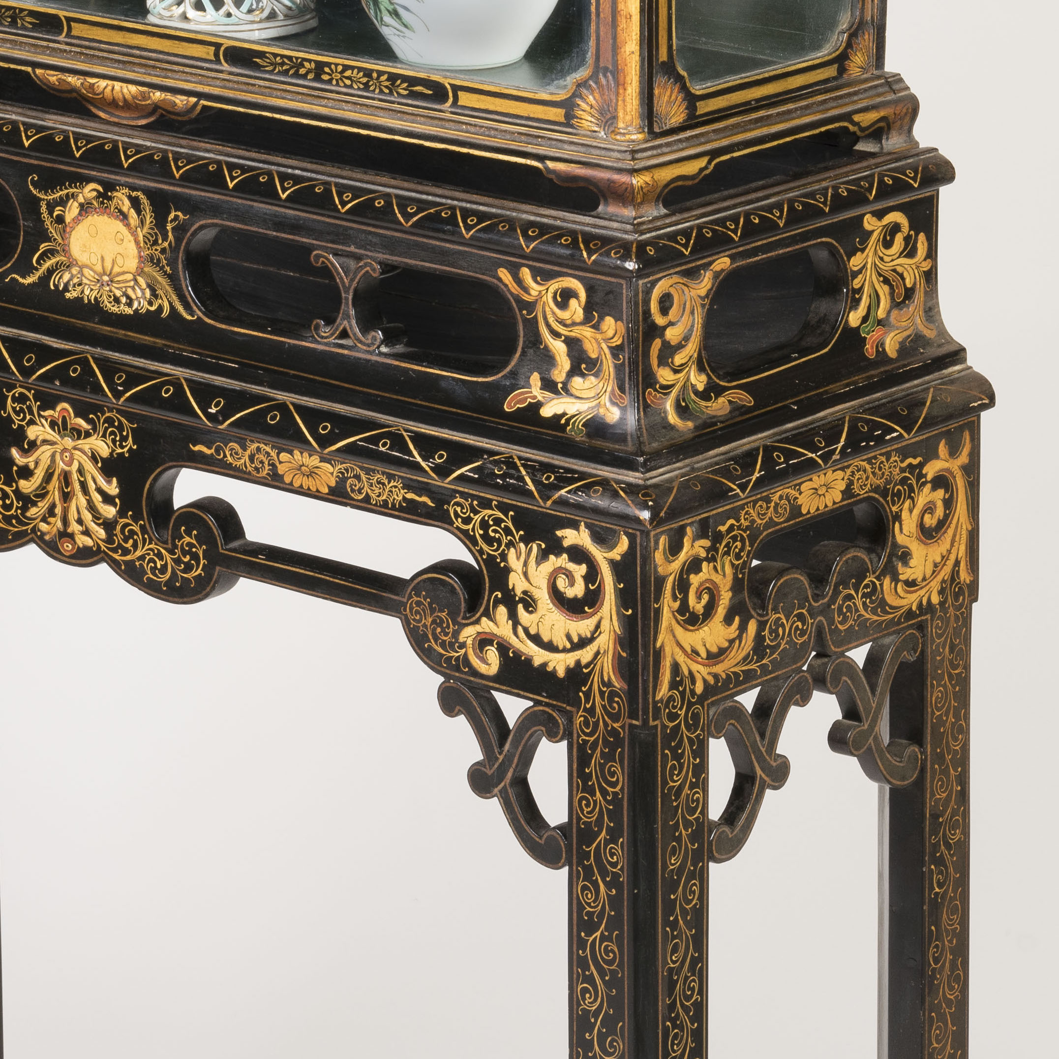 A Petite Chinoiserie Lacquered Display Case Attributed to Hille & Co