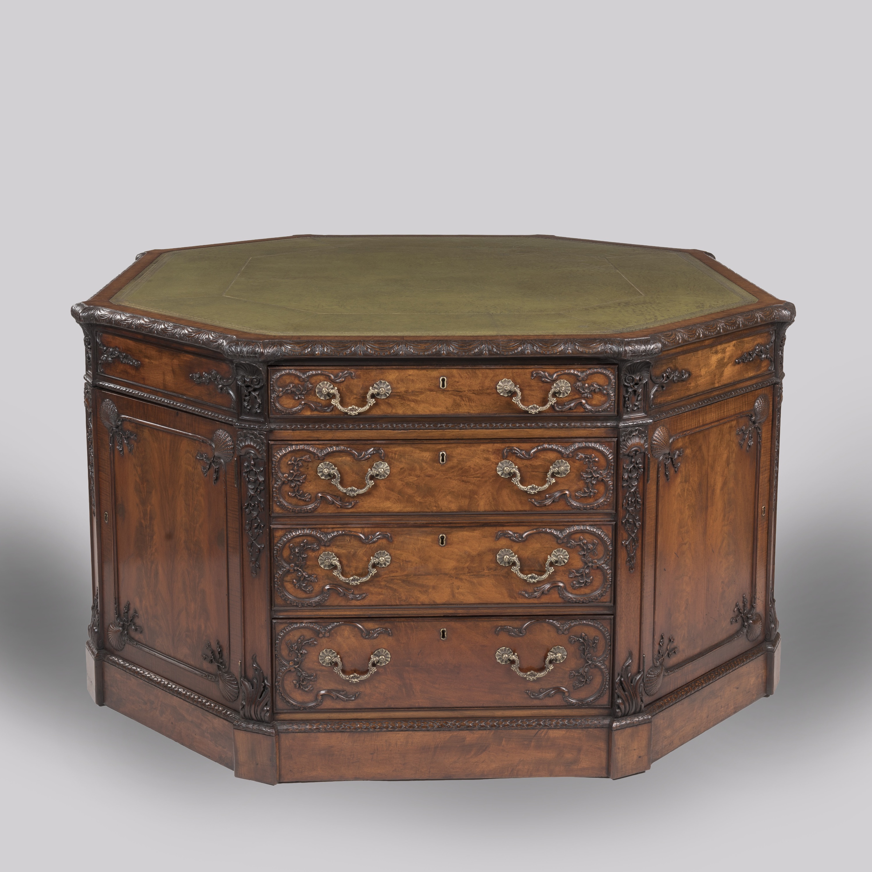 A Fine Octagonal Library Desk  By Henry Samuel of London