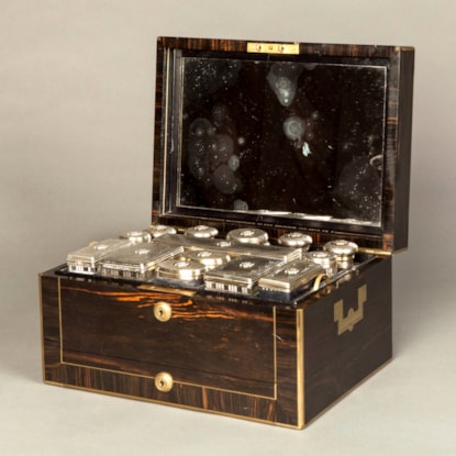 A Victorian coromandel and brass bound dressing case by Asprey