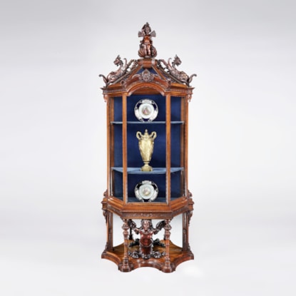 An Italian Carved Walnut Vitrine