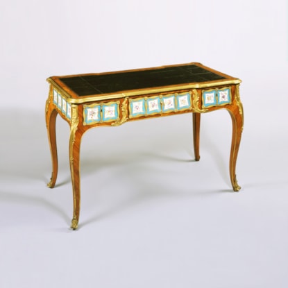 A Porcelain mounted Bureau Plat in the Manner of Edward Holmes Baldock