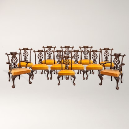 An Excellent Long Set of Carved Mahogany Dining Chairs